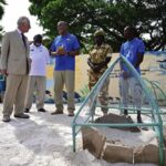 King Charles III meets Kenya Wildlife Service (KWS) Warden Segeant Shee at a turtle conservation site during a visit to Early Birds Banda, a community organisation that promotes marine conservation on Nyali Beach, Mombasa County, to hear about marine cons