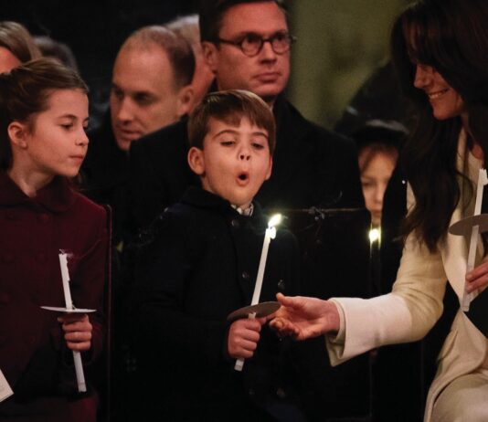 Princess of Wales to Host Abbey Carol Service Princess Charlotte, Prince Louis blowing out his candle and the Princess of Wales during the Royal Carols - Together At Christmas service at Westminster Abbey in London. December 8, 2023.