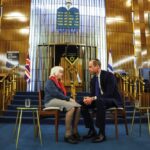 The Prince of Wales speaks with Renee Salt, 94, a Holocaust survivor, during a visit to the Western Marble Arch Synagogue in London. February 29, 2024.