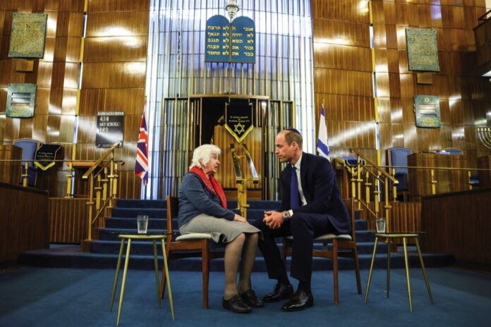 The Prince of Wales speaks with Renee Salt, 94, a Holocaust survivor, during a visit to the Western Marble Arch Synagogue in London. February 29, 2024.
