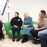 Queen Camilla (centre) meets volunteers and visitors during her visit to London’s Royal Free Hospital to officially open Maggie’s Royal Free, a new cancer support centre at the hospital. Picture date: Wednesday January 31, 2024.
