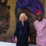 Queen Camilla with artist Babag during a visit to visit Kindred Studios’ pop-up hub in Shepherds Bush, west London, an art studios and creative space encouraging arts, crafts and community cohesion. Picture date: Wednesday February 14, 2024.