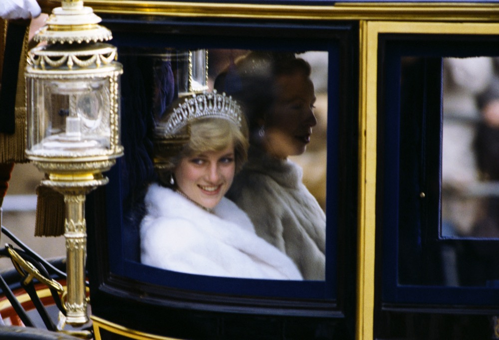 Diana, Princess of Wales, on her way to the State Opening of Parliament in November 1981. She is travelling in the Glass Coach used for her wedding (credit Anwar Hussein)