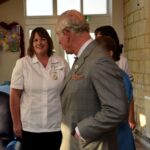Sue Ryder Leckhampton Court Hospice’s Jo Cadogan on a visit from His Majesty in 2018 during his patronage as Prince of Wales. Credit: Rob Lacey